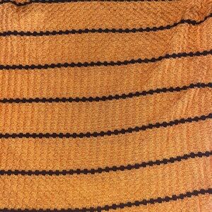 Orange and black sweater